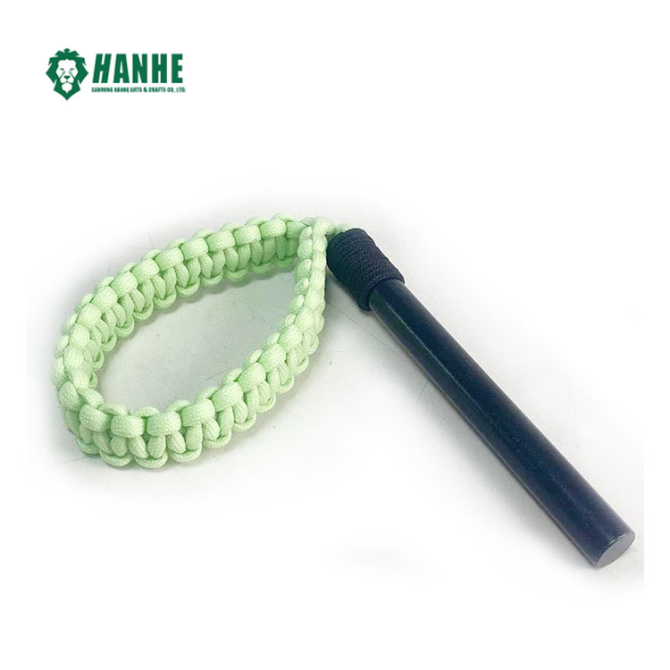 Features and considerations for a paracord handle fire starter